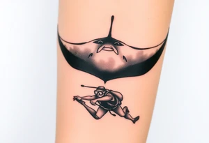 Manta ray silhouette above, scuba diver underneath, water background tattoo idea