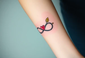 A infinity symbol adorned with golden leaves and a tiny red heart tattoo idea
