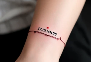 IV.III.MMIII in black and crimson ink wrapped around the wrist like a bracelet, symbolizing triplets’ birthday. tattoo idea