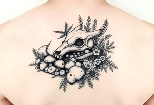 woodland floor with mushrooms, moss, a fox skull, insects, ferns, and flowers tattoo idea