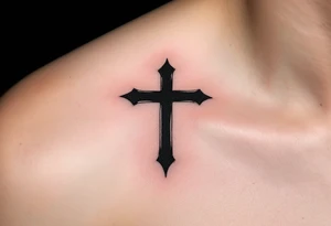 A small, sharp-edged black cross tattoo placed just beneath the outer corner of the eye on face. tattoo idea