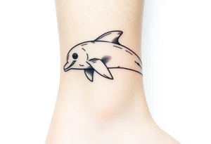 Cartoon dolphin on the ankle tattoo idea
