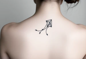 hand letting go kite tattoo idea