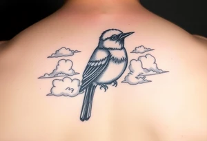 Kentucky bluebird with realistic clouds tattoo idea