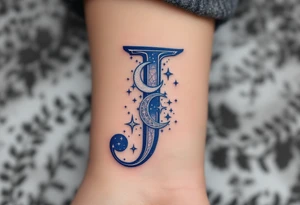 Celestial-themed "J" in midnight blue with silver crescent moons and stars. tattoo idea