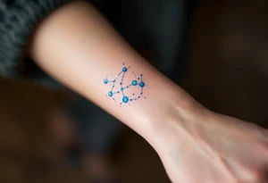 An ethereal Aries tattoo uses dots of light-blue and white to form the constellation in a dreamy galaxy swirl. tattoo idea