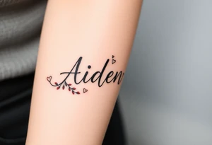 The name Aiden with love theme around it tattoo idea