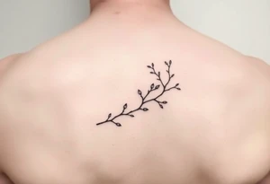 thin simple clean vines with small branch off tattoo idea