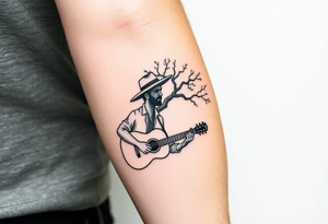 Man with hat but cant see face 
playing acoustic guitar underneath tree of life concept style tattoo idea