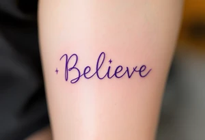 The word "Believe" in purple, with subtle lightning bolts in white surrounding it, signifying power and inspiration. tattoo idea
