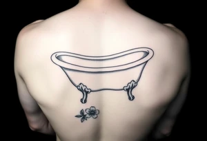 clawfoot bathtub with visible bathroom floor and a flower on the floor tattoo idea