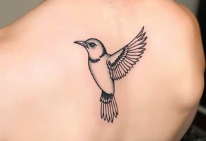 Micro realism bird tattoo idea
