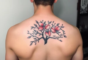 Peach tree with names scripted as branches tattoo idea