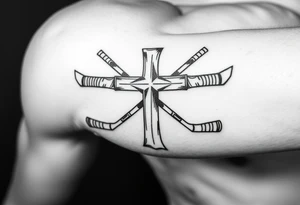 Cross made with hockey sticks tattoo idea