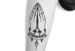 Prayer hands with Last Name Obando on calf tattoo idea