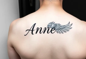 the name Anne in a phoenix feather tattoo idea