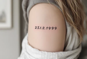 Cursive 25.12.1999 flowing along the spine in cool gray with a hint of icy blue. tattoo idea