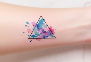 A watercolor triangle filled with splashes of blue, pink, and purple, representing creativity and fluidity. tattoo idea