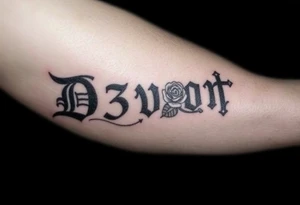 Name D3von spelt going down my arm with a crown and rose and cross and 03/27/07 tattoo idea