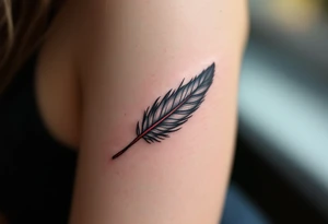A single eagle feather in gray and black, tied with a red leather strand. tattoo idea