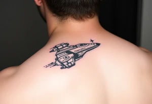 Shoulder tattoo of a spaceship and a star. tattoo idea