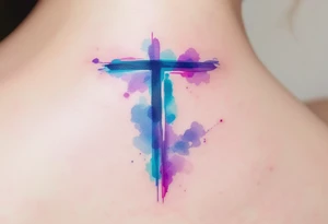 A watercolor-style "T" in shades of turquoise and purple, blending like paint strokes. tattoo idea