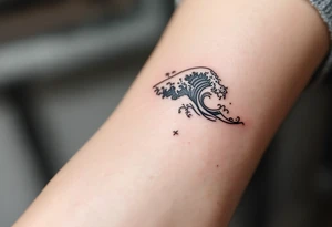 A minimalist black wave symbolizes the free and uncontrollable nature of the sea. tattoo idea