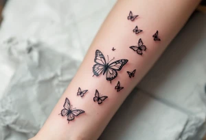 Tattoo of about 10 butterflies that look 3d with lines
 and different sizes spaced out between wrist and elbow tattoo idea