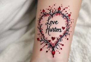 A heart with the words "Love Hurts" carved into it, with dark red ink resembling fresh wounds. tattoo idea