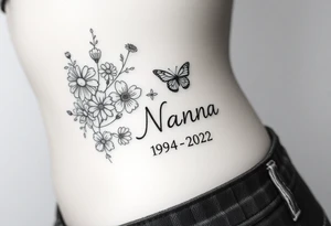 flowers and butterflies with the name “NANA” and the date “1954-2022” mixed all together on the side of the rib cage tattoo idea
