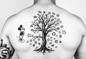 Autism full left arm sleeve including Mickey Mouse and a tree at the start with autism puzzle pieces everywhere tattoo idea