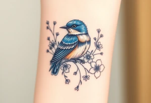 powerful majestic bluebird surrounded by wild flowers tattoo idea