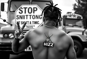 Mac Dre Standing doing the sign for time out in football n front of a short bus stopped at a stop sign that says STOP SNITCHING on it with a chain around his neck that has a pendent that says THIZZ and below that ENT tattoo idea