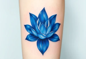 A deep blue water lily, with soft silver outlines and subtle star-like sparkles tattoo idea