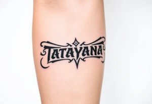 Tattoo for a man that says the name “Tatayana” tattoo idea