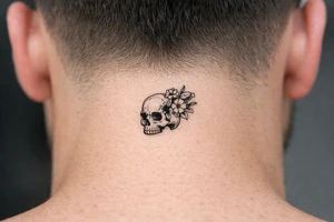 Skull with bullet hole, flowers erupting from the exit wound. tattoo idea