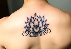 serene lotus flower emerging from sacred waters with ripples tattoo idea