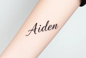 The name Aiden chunky
 and bold cursive tattoo idea