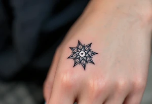 A silver eight-pointed star tattoo suggests clarity, intuition, and a lunar connection. tattoo idea