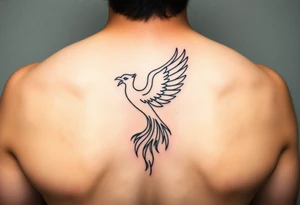 magnificent phoenix rising from golden flames with trailing embers tattoo idea