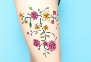Vine with alternating flowers daffodil,
Lily, chrysanthemum, rose, aster, narcissus tattoo idea