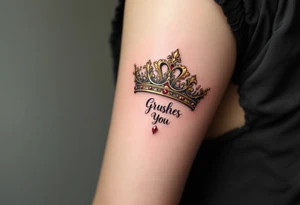 Baroque-style crown designs with gold and ruby detailing, sitting atop script names. tattoo idea