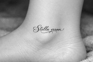 Stella erran, and then beautiful calligraphy cursive on the inner ankle tattoo idea