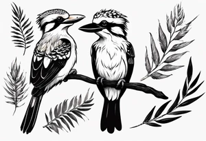 Small kookaburra holding wattle leaves tattoo idea