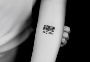 minimalist barcode with the couple’s wedding date (22 - 03 - 2012) hidden in the numbers under barcode with heart tattoo idea