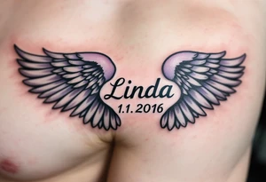 pair of angel wings enclosing name Linda and numbers 1.1.2016 v 0:01", done in light gray and faded lilac. tattoo idea