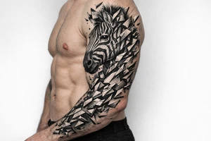 Hyperrealistic zebra head shattering into geometric shards across shoulder and chest. tattoo idea