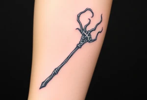 A Death Eater wand with a twisted bone-like structure, emitting dark magical tendrils tattoo idea