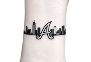 Atlanta city skyline with the Atlanta Braves “A” letter logo tattoo idea