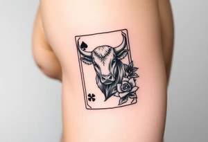A king play card with a small highland cow face on it and a small 4 leaf clover surrounded by roses tattoo idea